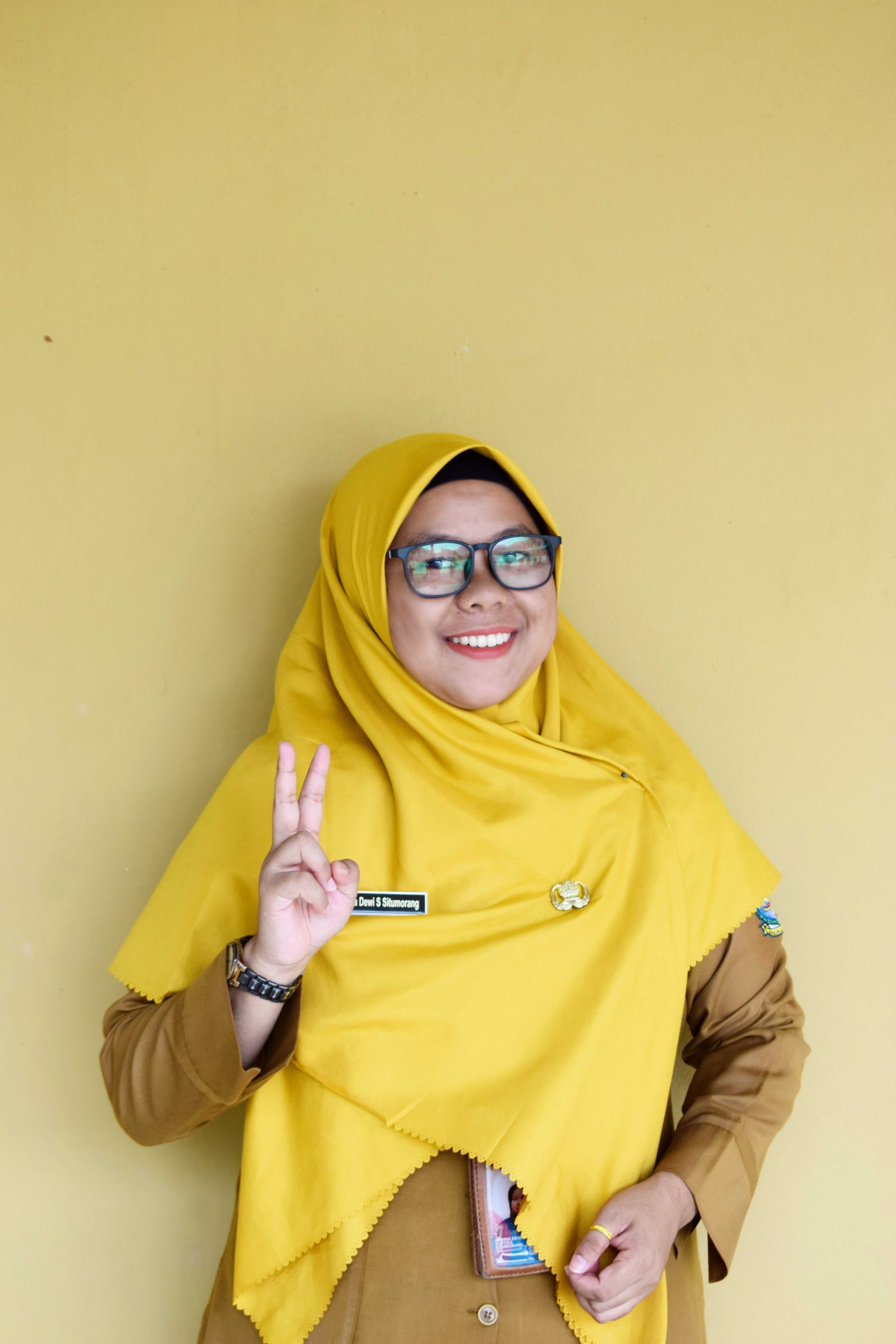 APRINA DEWI SARTIKA SITUMORANG, S.Pd.