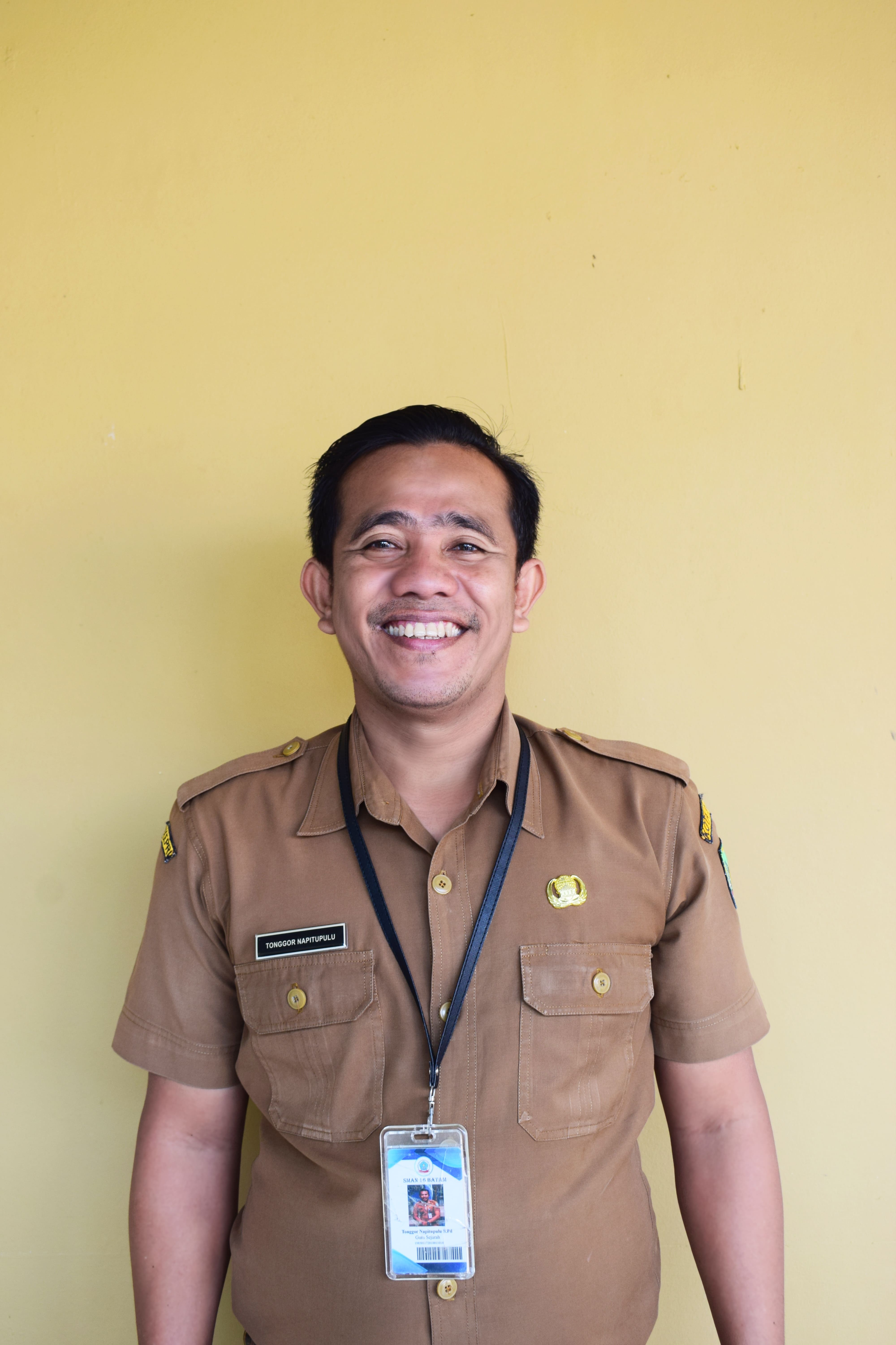 TONGGOR NAPITUPULU, S.Pd